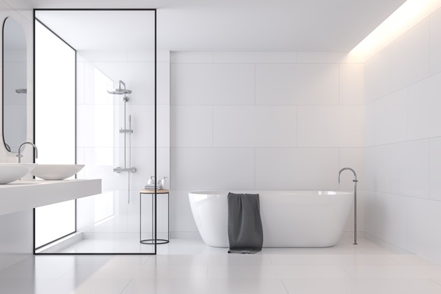 Space-saving corner bathtub installed in a compact bathroom